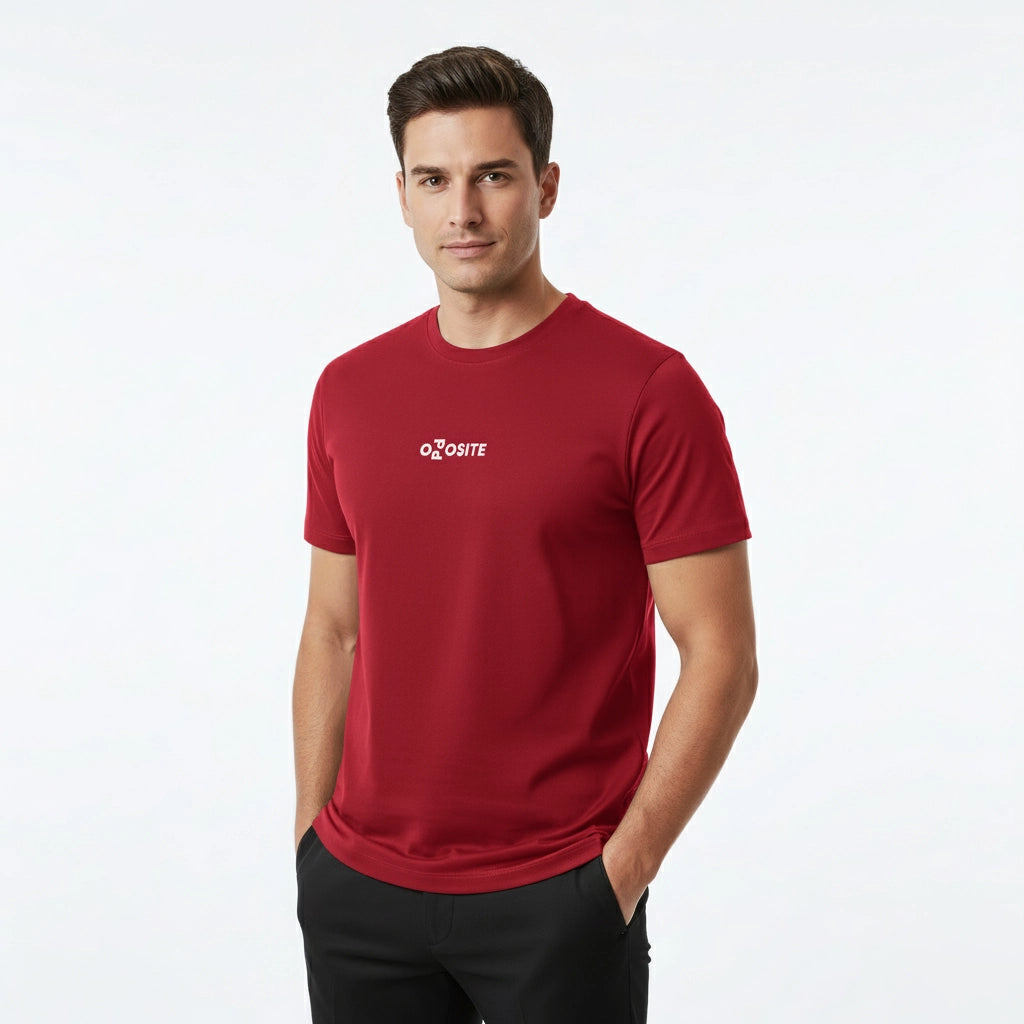 Man wearing a red t-shirt with a logo on a white background