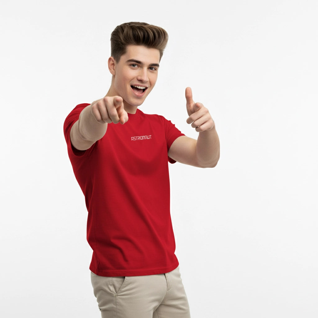 Person wearing a red t-shirt with a brand logo, pointing forward on a white background