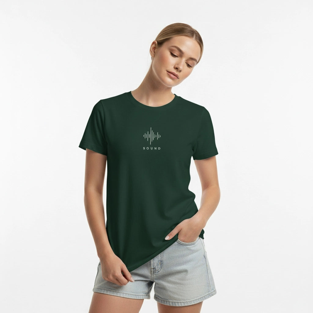 Woman wearing a green t-shirt with a sound wave design on a white background