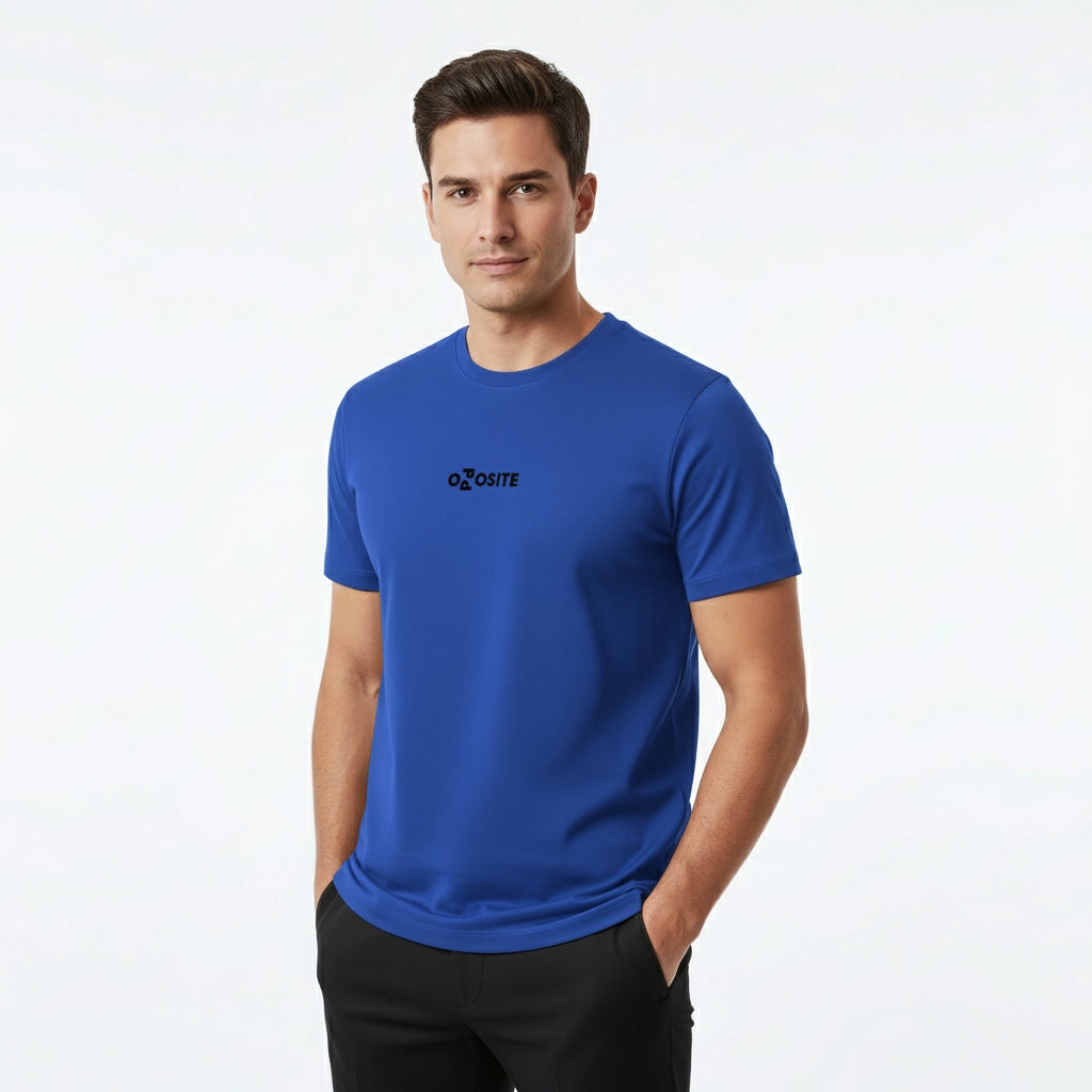 Man wearing a blue t-shirt with a logo on a white background