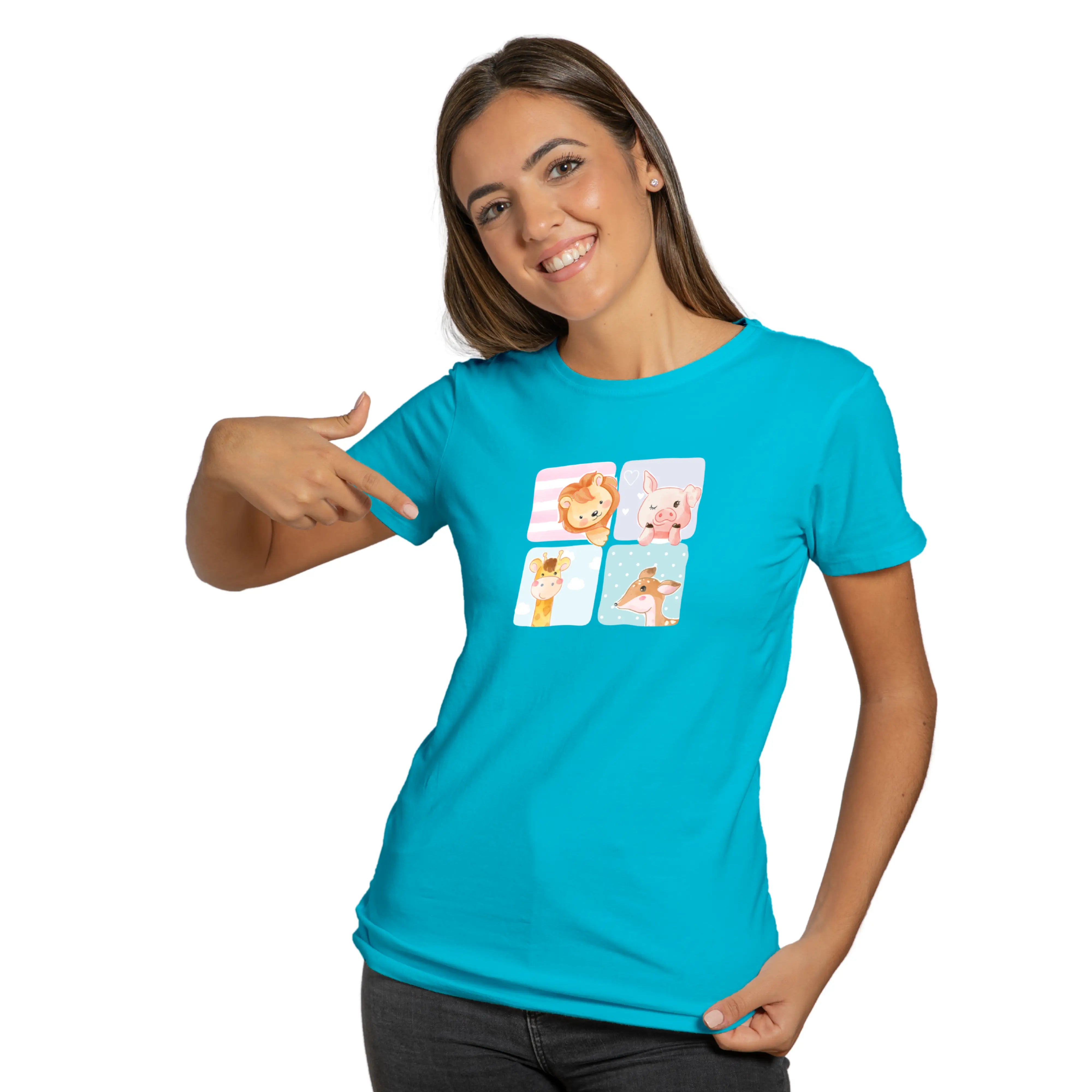 Woman wearing a turquoise t-shirt with cartoon character designs on a white background