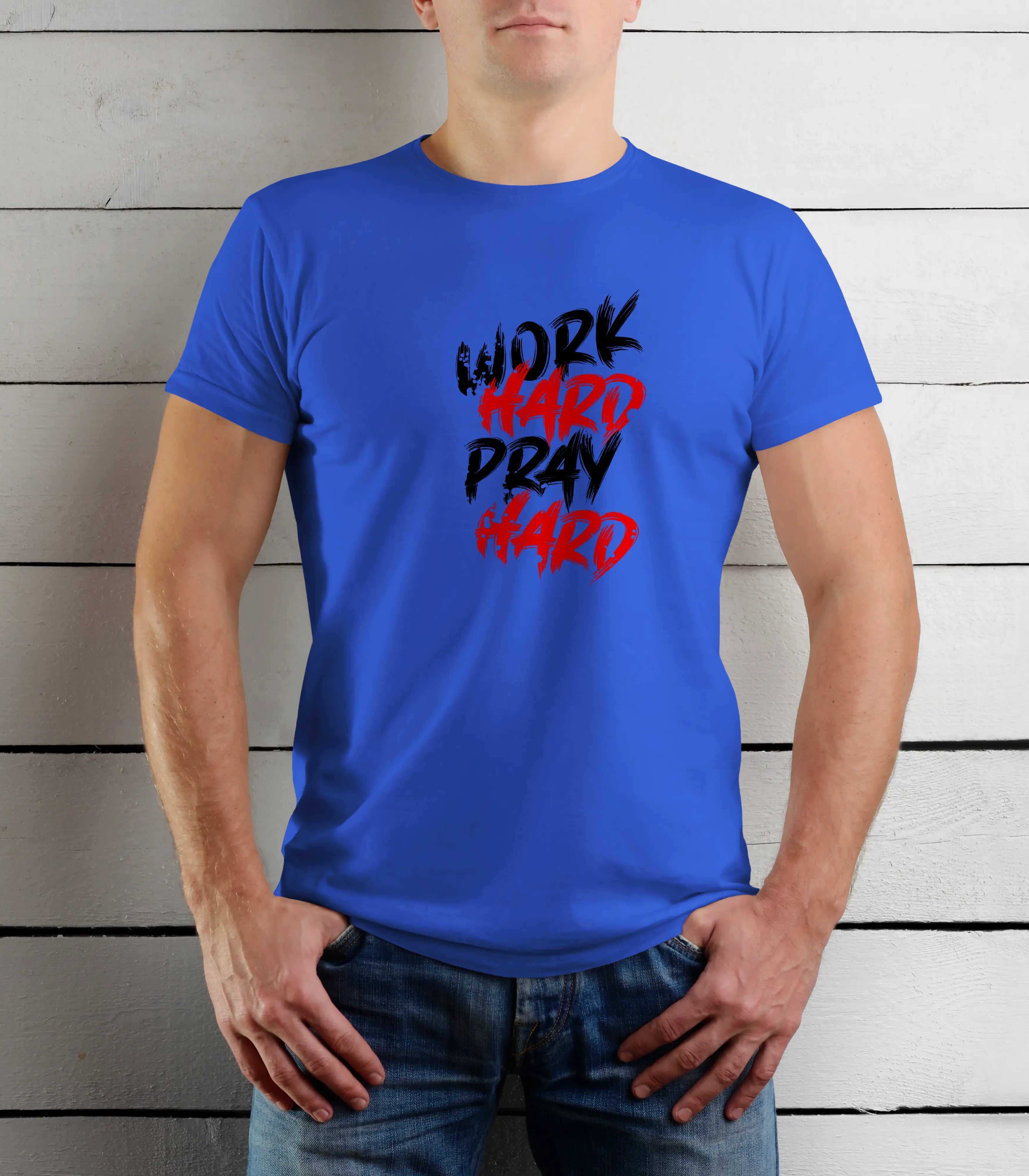 Person wearing a blue t-shirt with 'Work Hard Pray Hard' text against a wooden background