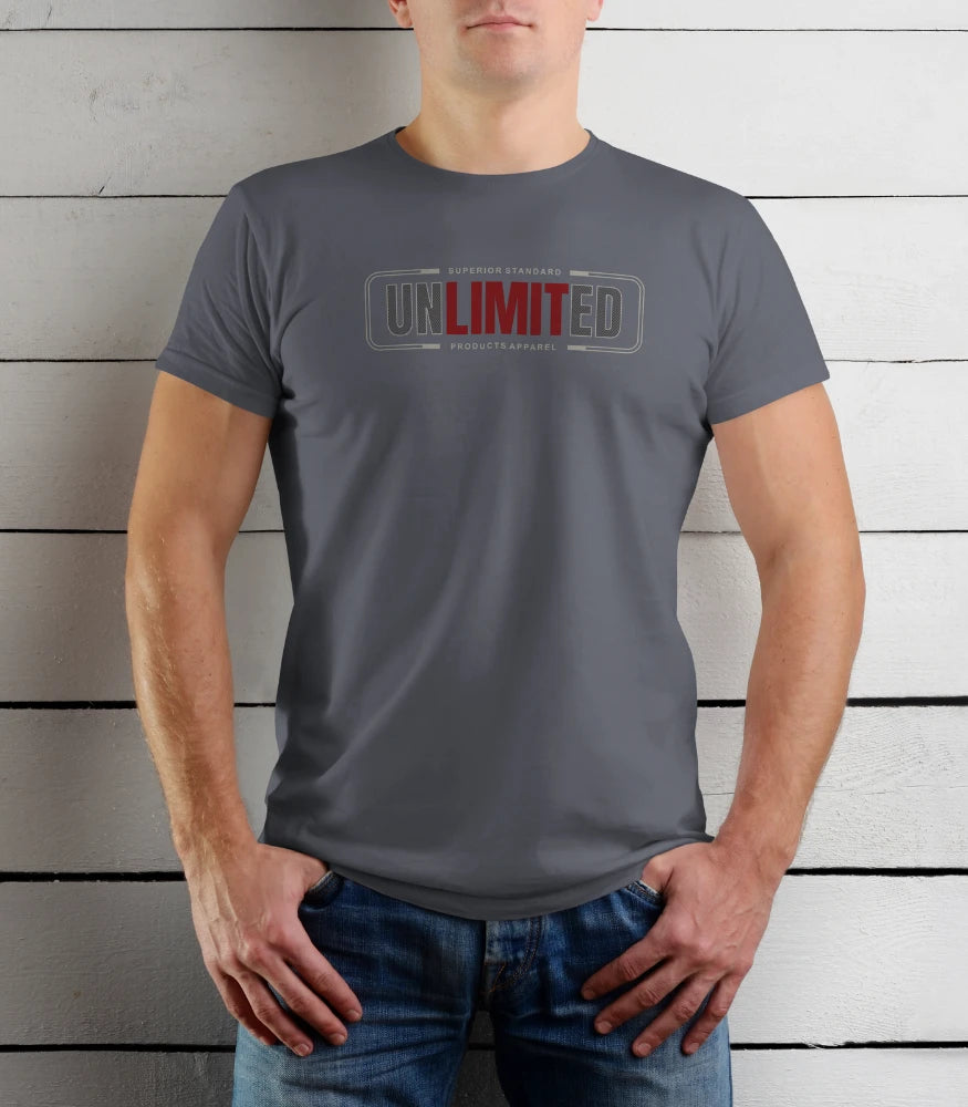 Person wearing a gray t-shirt with 'UNLIMITED' logo against a wooden background