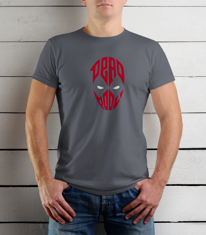Person wearing a gray t-shirt with a red graphic design on a wooden background