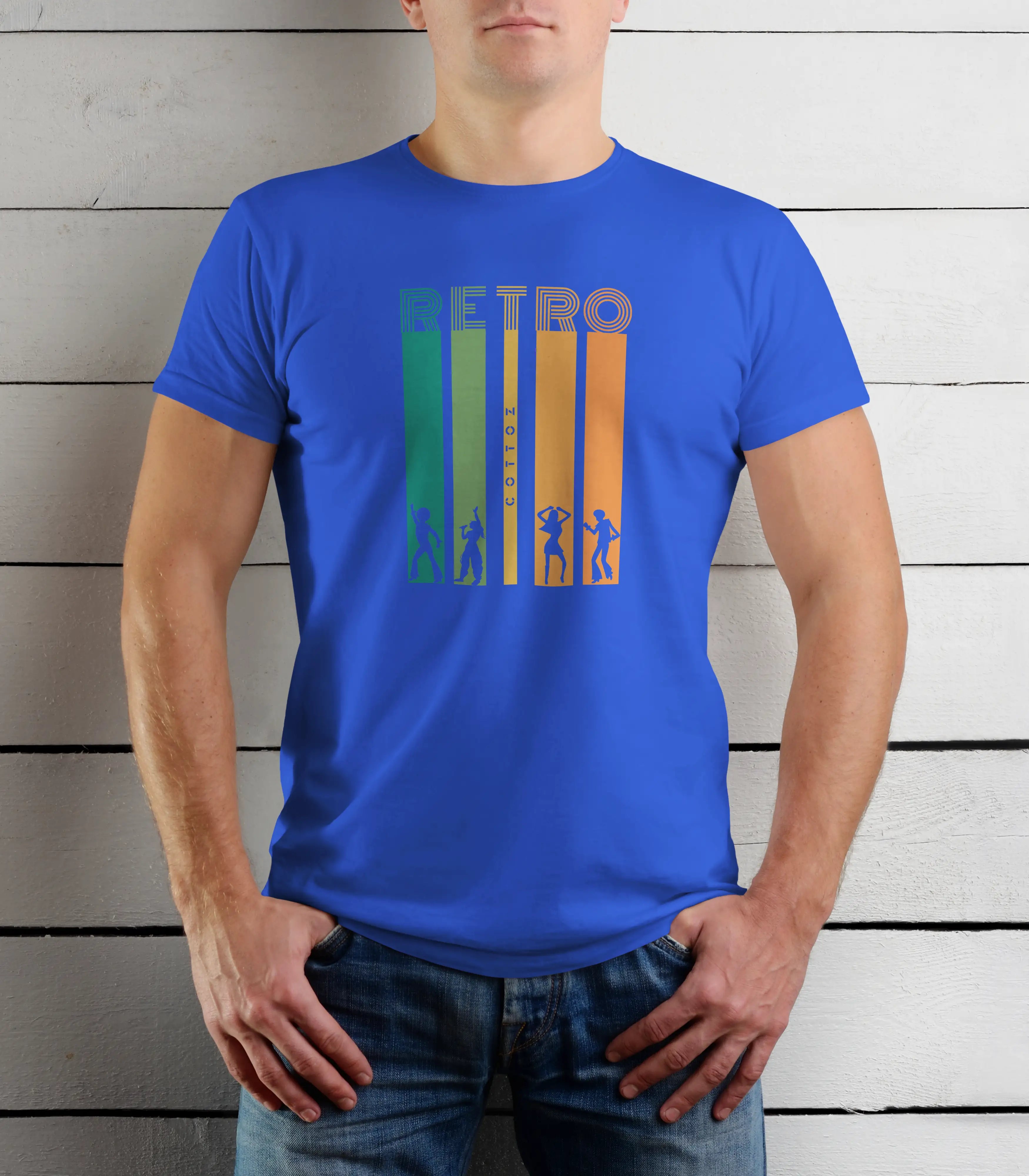 Person wearing a blue t-shirt with a retro design against a wooden background