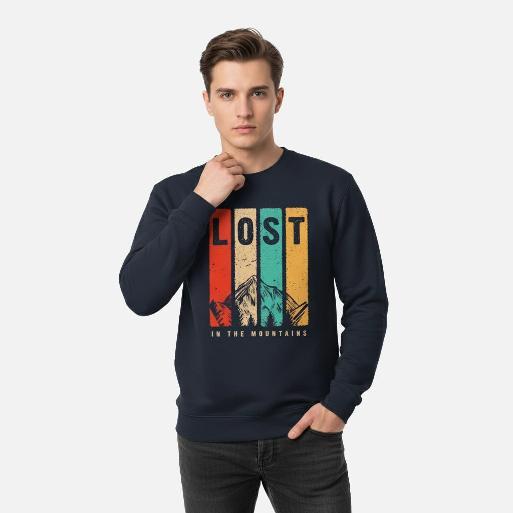 Man wearing a navy blue sweatshirt with 'Lost in the Mountains' graphic design on a white background