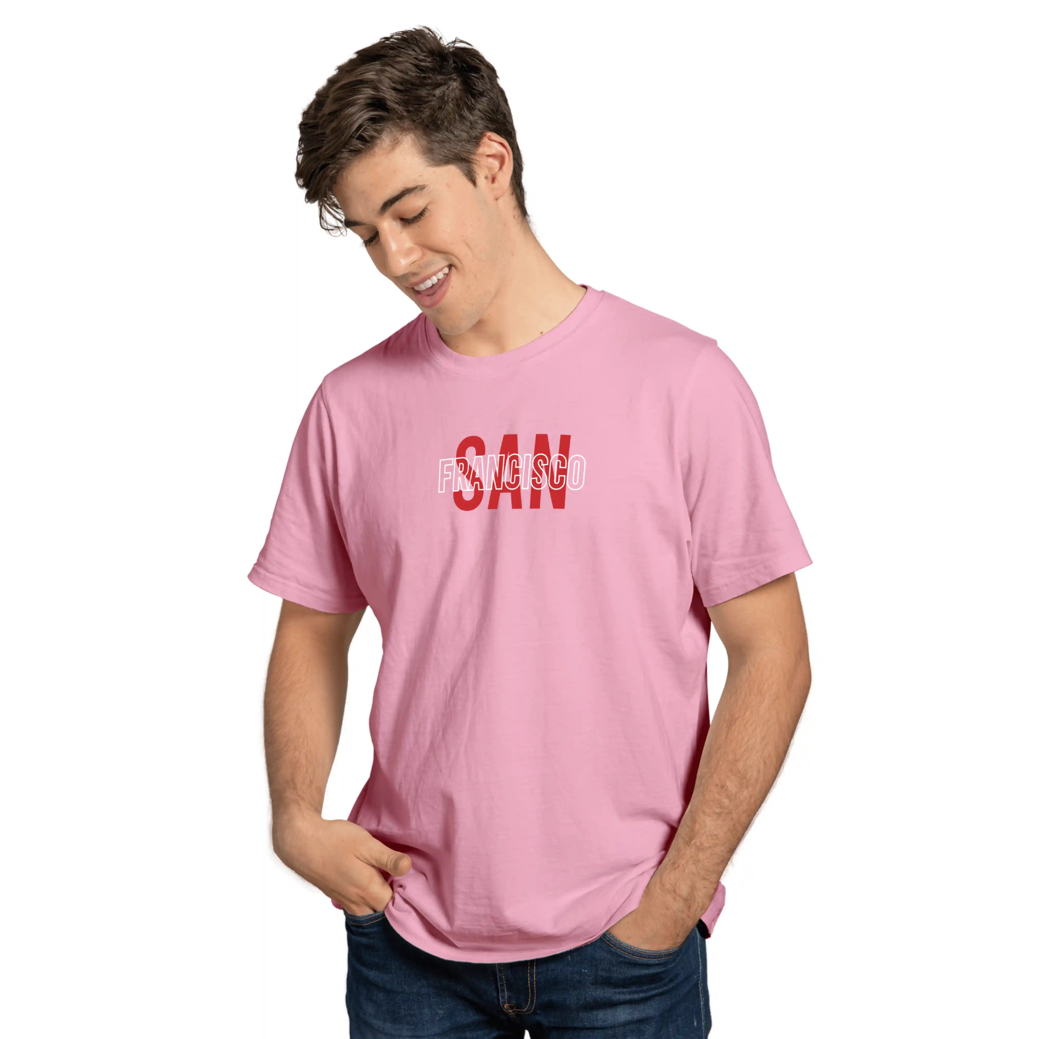 Person wearing a pink t-shirt with text on a white background