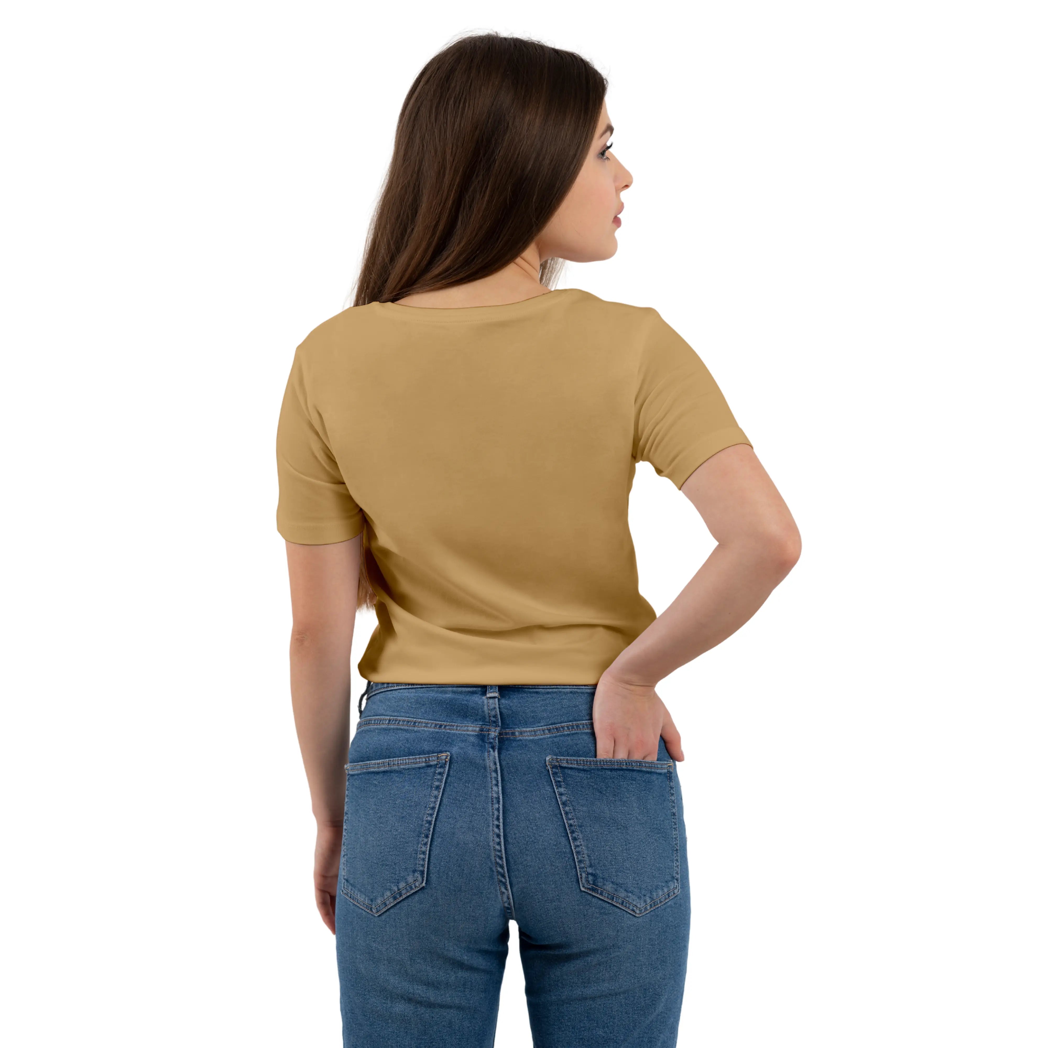Woman wearing a beige shirt and blue jeans on a white background