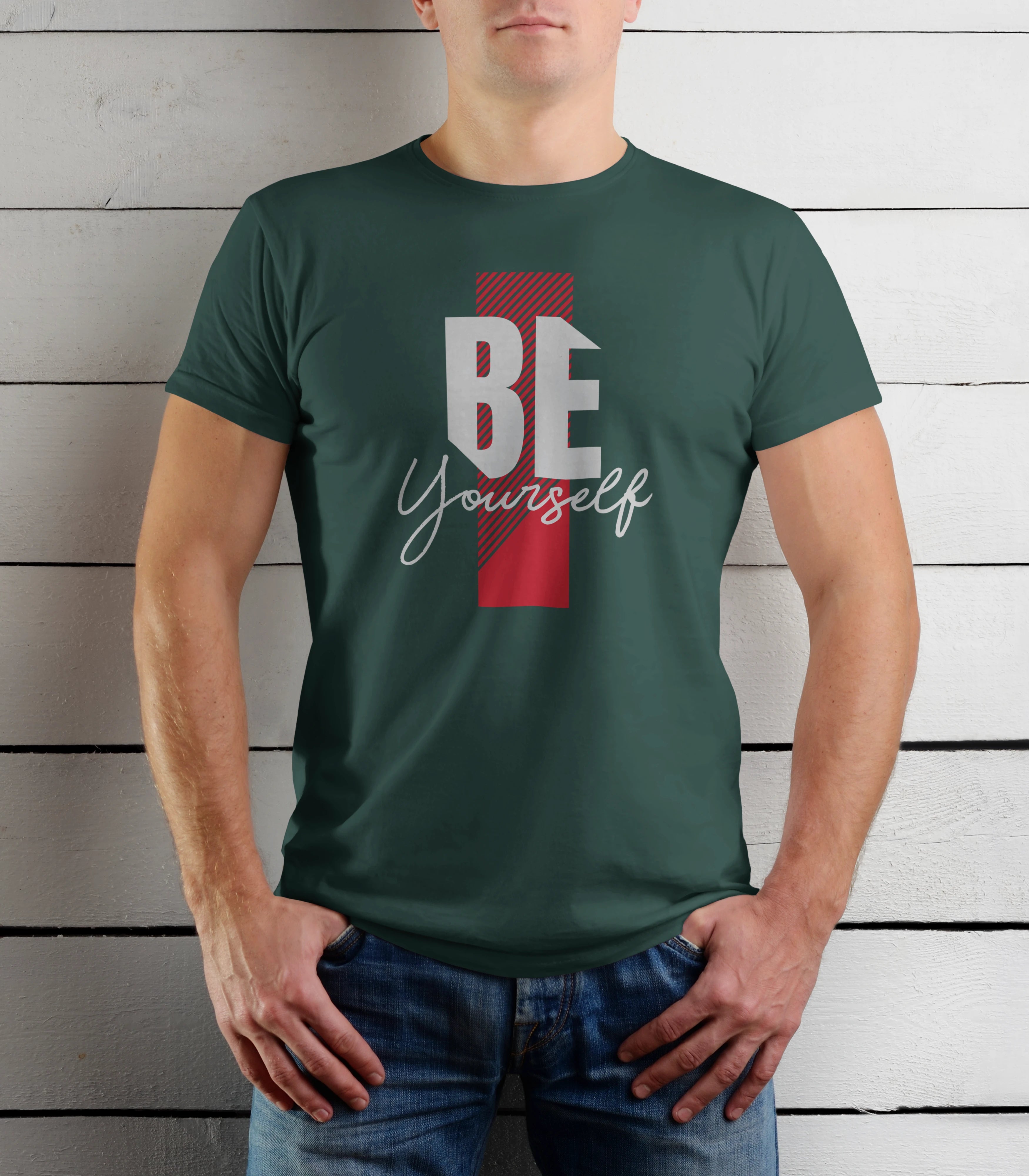 Person wearing a green t-shirt with 'BE Yourself' text against a wooden background