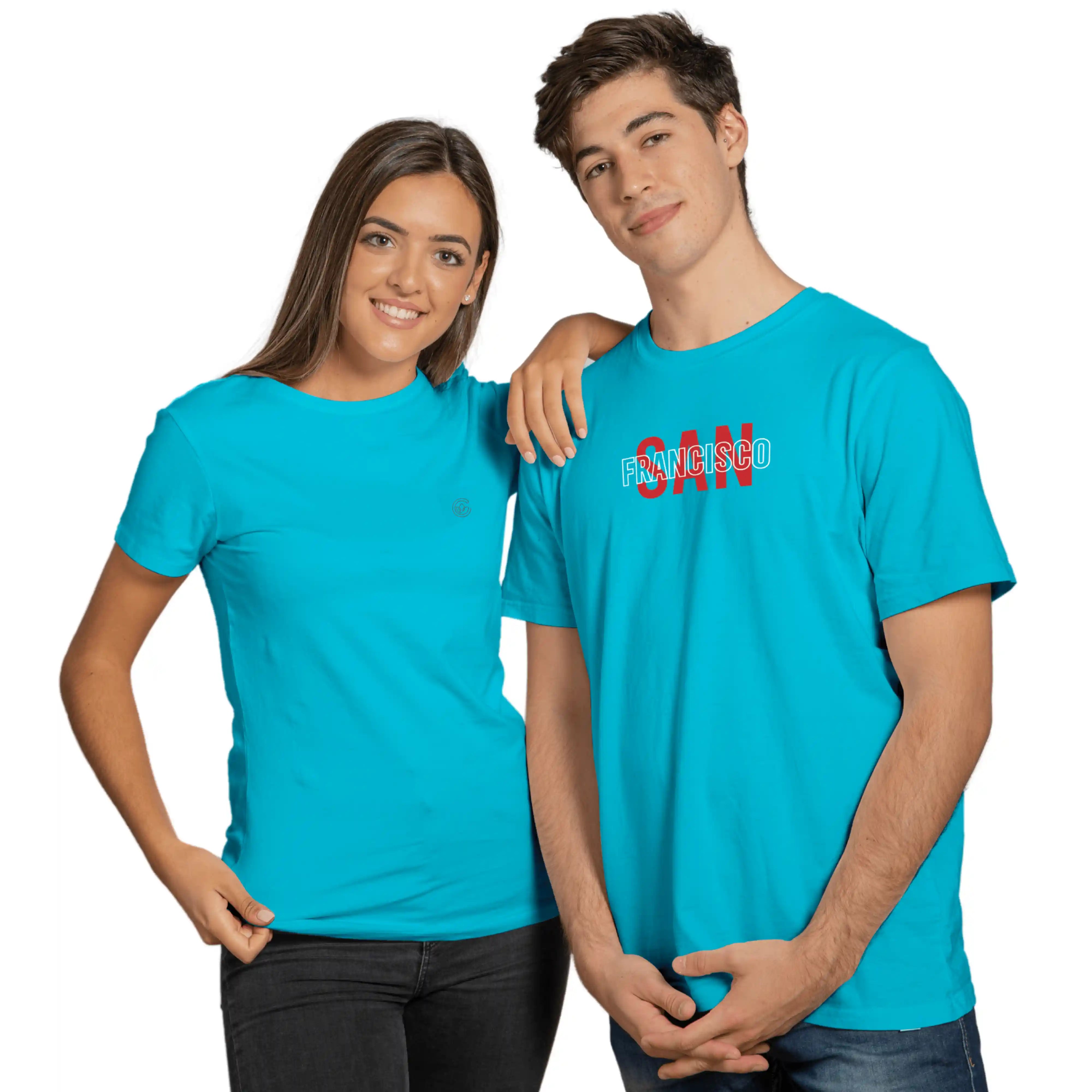 Two people wearing matching blue t-shirts with red text on a white background