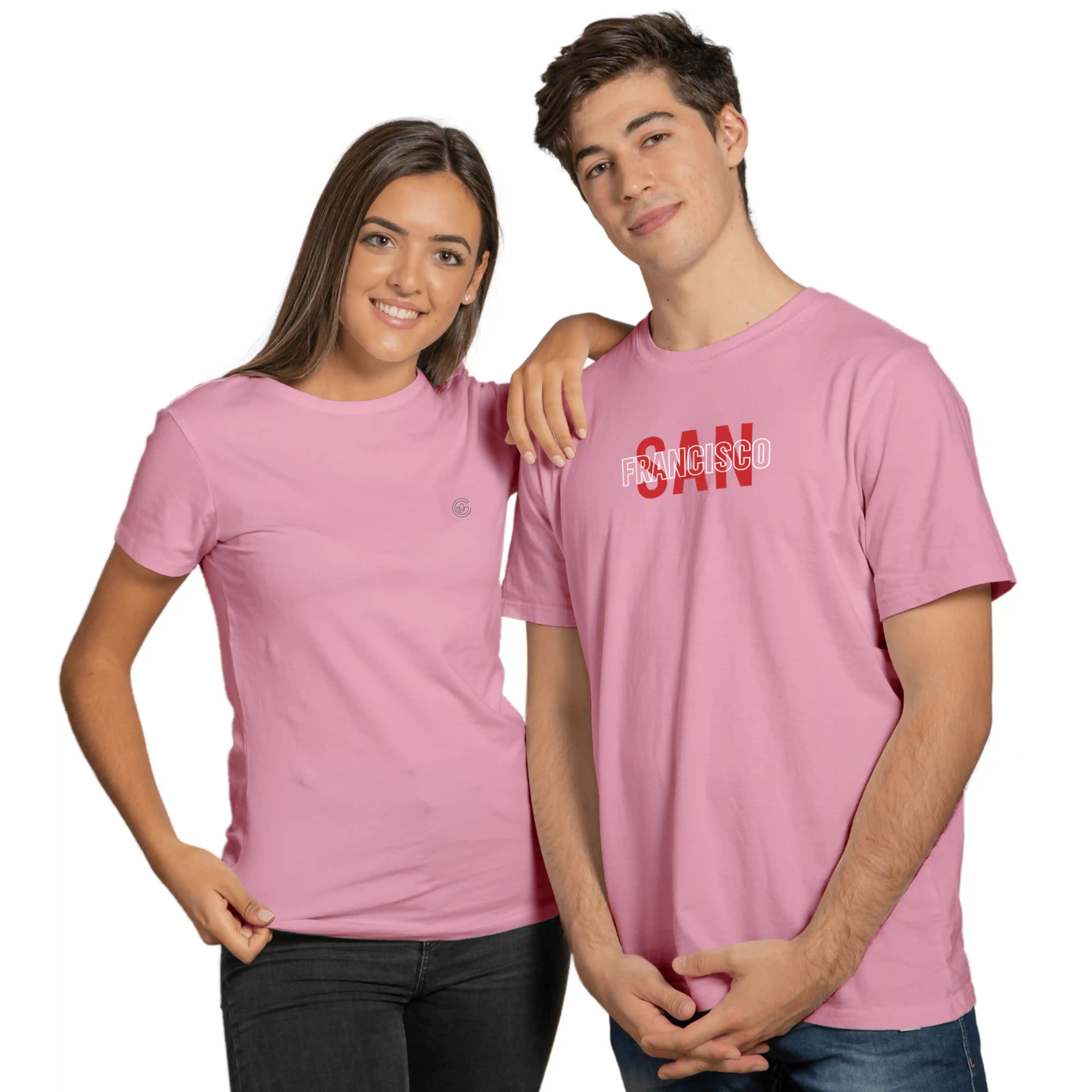Two people wearing pink t-shirts with text on a white background