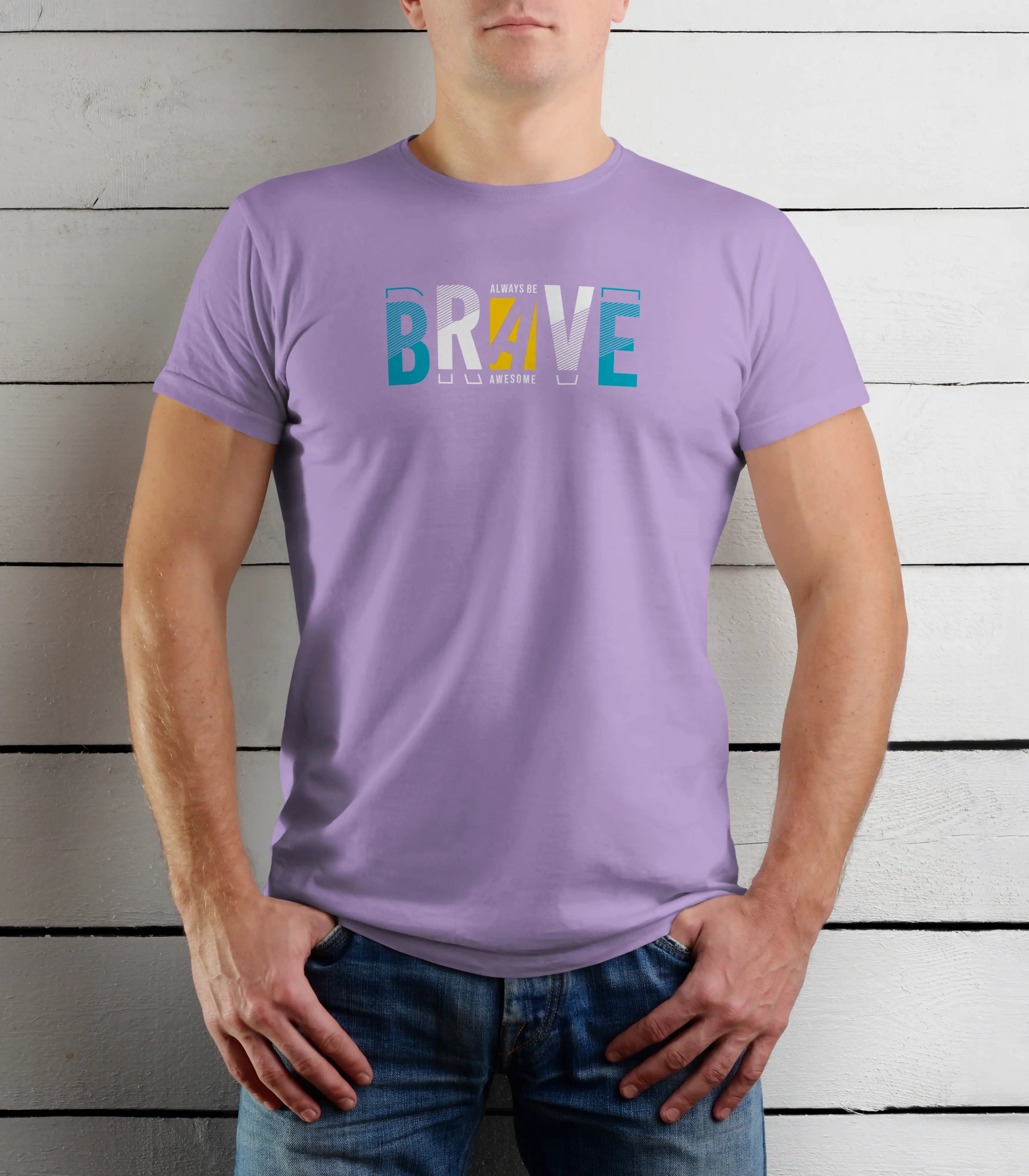 Person wearing a purple t-shirt with 'BRAVE' printed on it against a wooden background