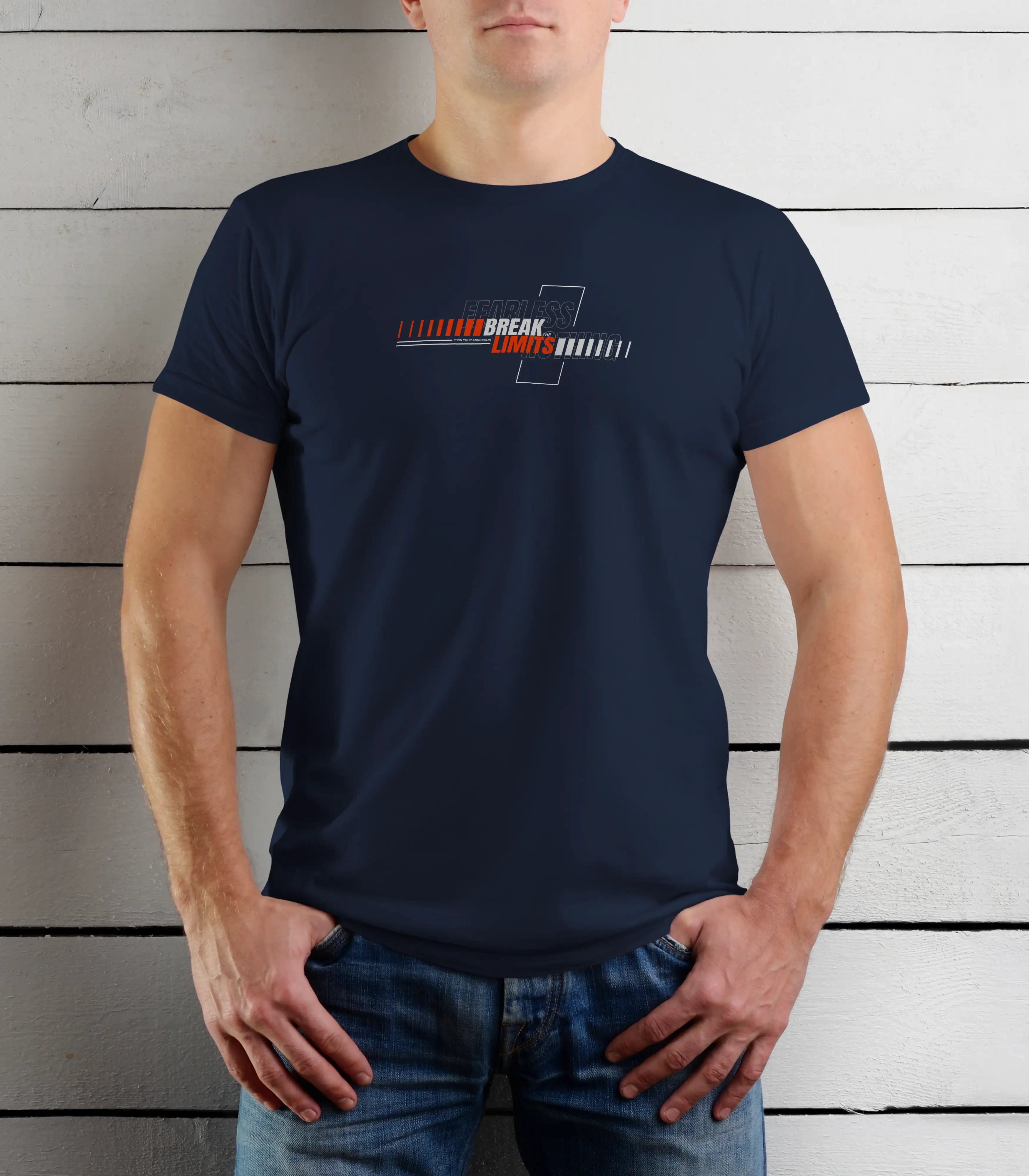 Person wearing a navy blue t-shirt with a logo against a wooden background
