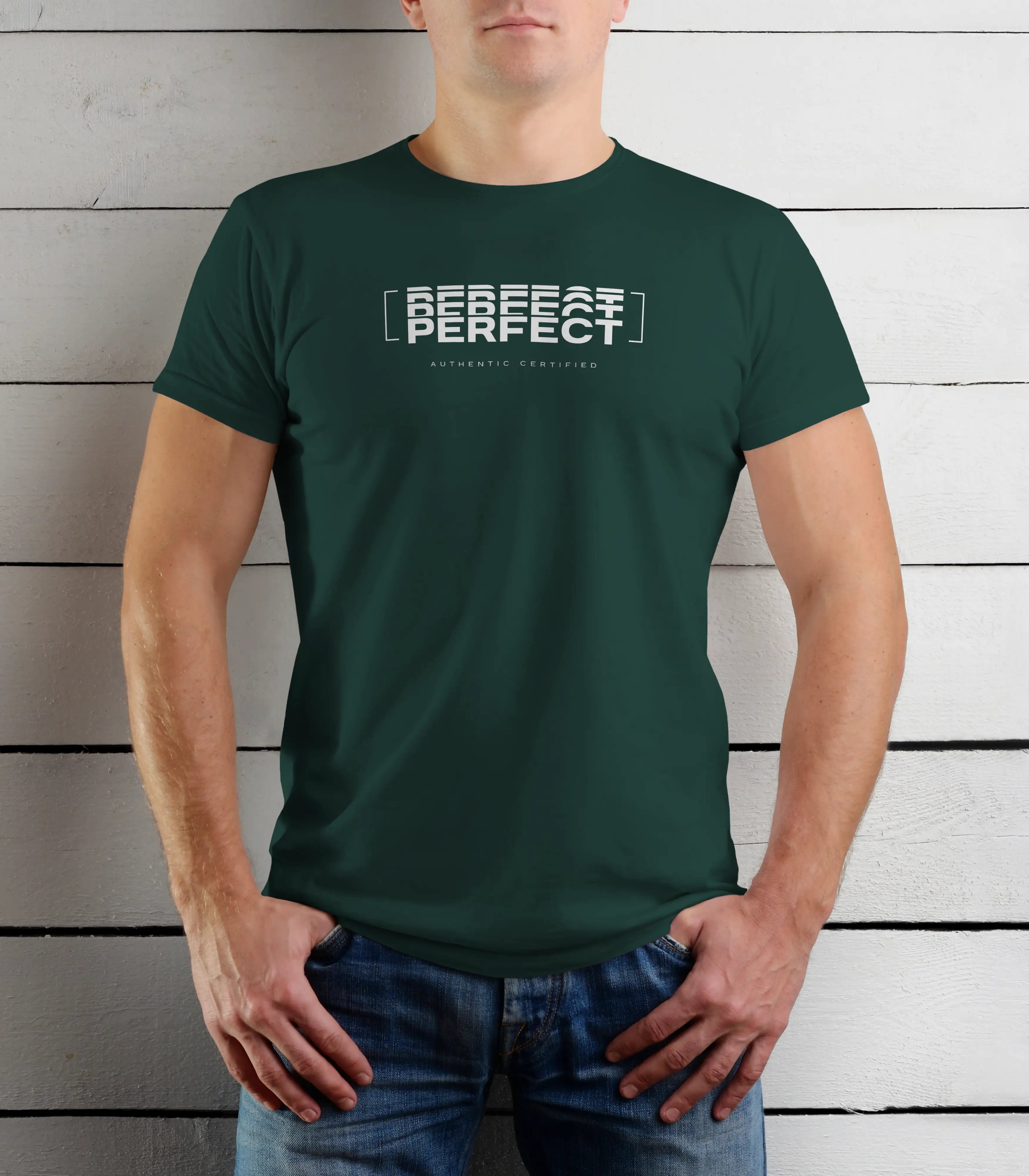 Person wearing a green t-shirt with text design against a wooden background